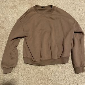 brown sweatshirt